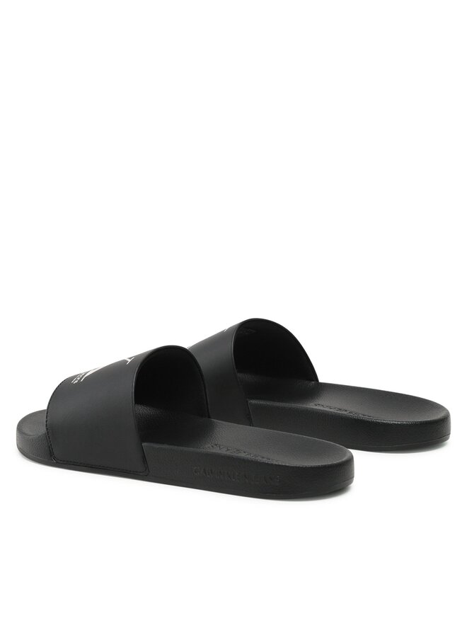 Calvin Klein Jeans Pantoletten Calvin Klein Jeans Slide Oversized Brand YM0YM00662 Schwarz