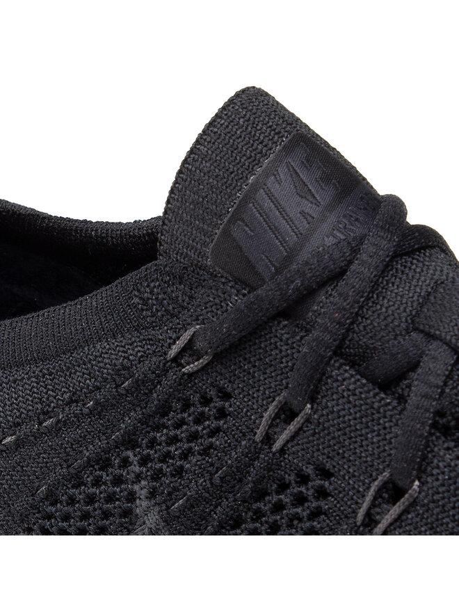 Black flyknit trainers store