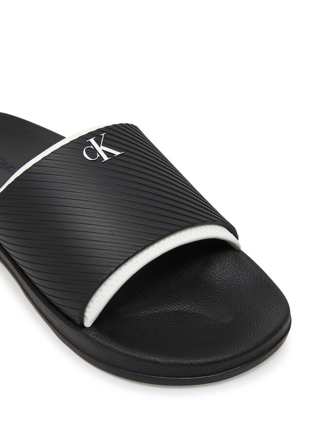 Calvin Klein Jeans Šľapky Calvin Klein Jeans Slide Rubber Neoprene Text YM0YM01234 Čierna