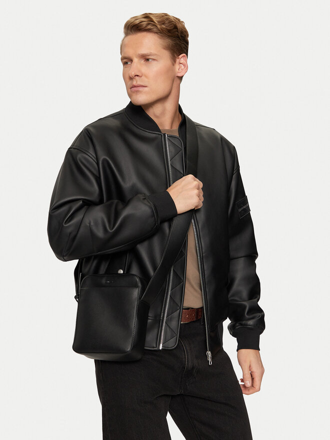 Calvin Klein Torbica za okrog pasu Calvin Klein Ck Refined Reporter K50K512755 Črna