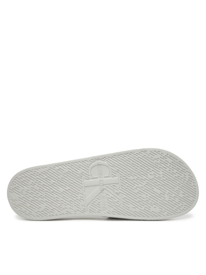 Calvin Klein Jeans Pantoletten Calvin Klein Jeans Slide Aop Print YM0YM01269 Grau