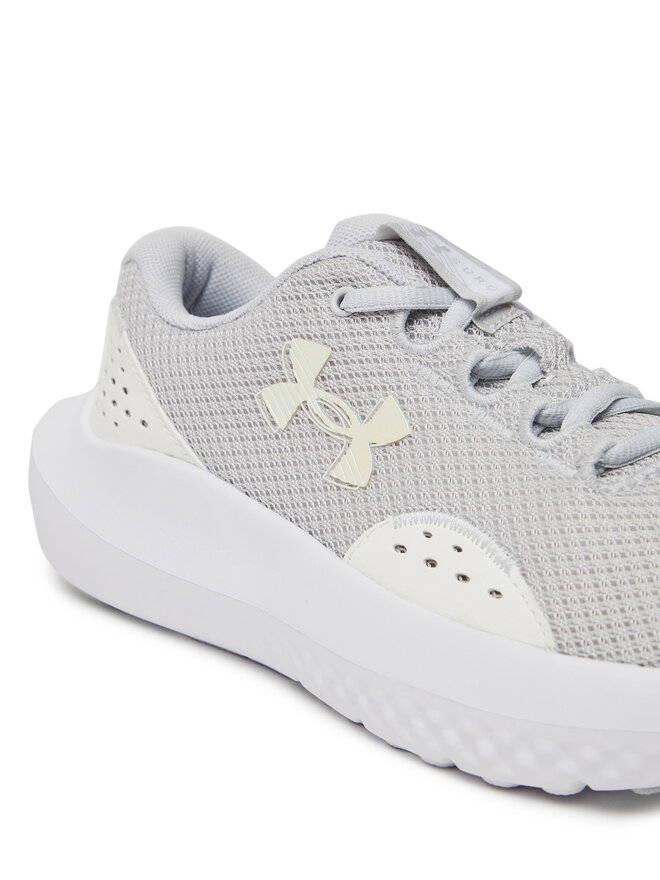 Under Armour Tekaški čevlji Under Armour UA GGS Surge 4 3027108 Siva