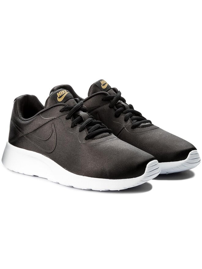Black and gold nike tanjun outlet