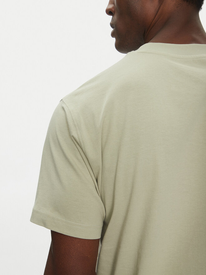 New Balance New Balance T-Shirt Reimagined Graphic MT51506 Grün Relaxed Fit