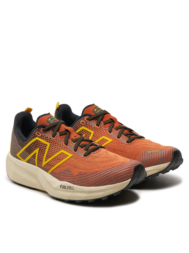 New Balance Buty do biegania New Balance fuel_cell Venym MTVNYMR1 Pomarańczowy