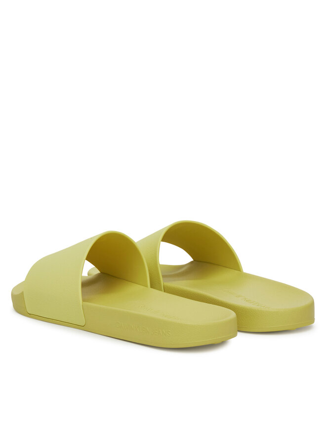 Calvin Klein Jeans Pantoletten Calvin Klein Jeans Slide Monogram Tpu YW0YW01715 Gelb