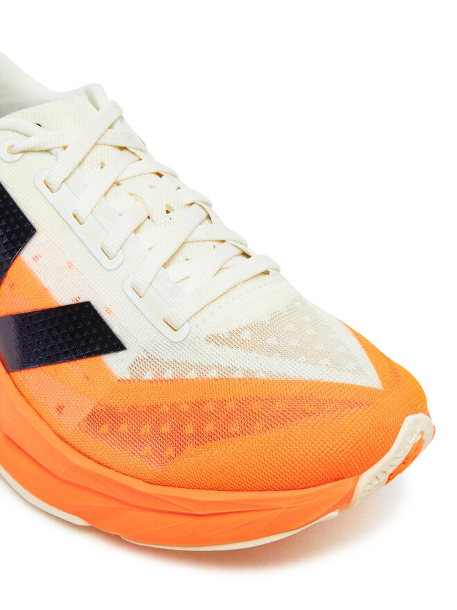 New Balance Bežecké topánky New Balance FuelCell Rebel v4 WFCXCC4 Oranžová