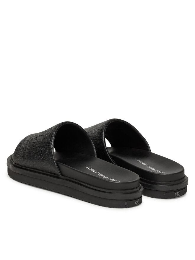 Calvin Klein Jeans Pantoletten Calvin Klein Jeans Flat Molded Slide Sandal Lth YM0YM01225 Schwarz