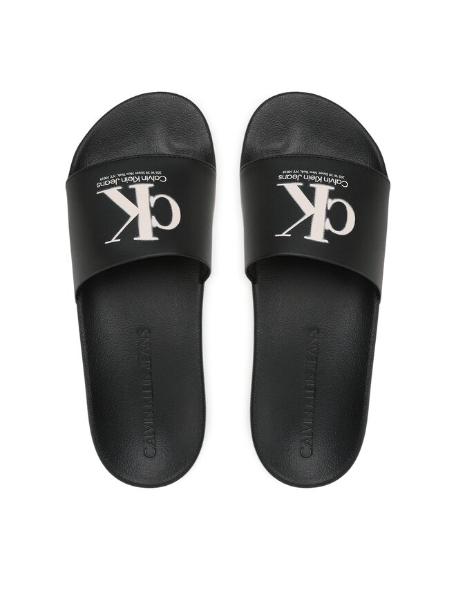 Calvin Klein Jeans Pantoletten Calvin Klein Jeans Slide Oversized Brand YM0YM00662 Schwarz