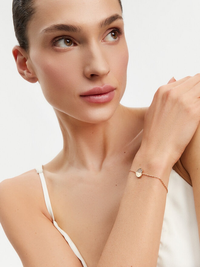 Guess Pulsera Guess Lovely Guess JUBB03 036JW Baño de oro amarillo