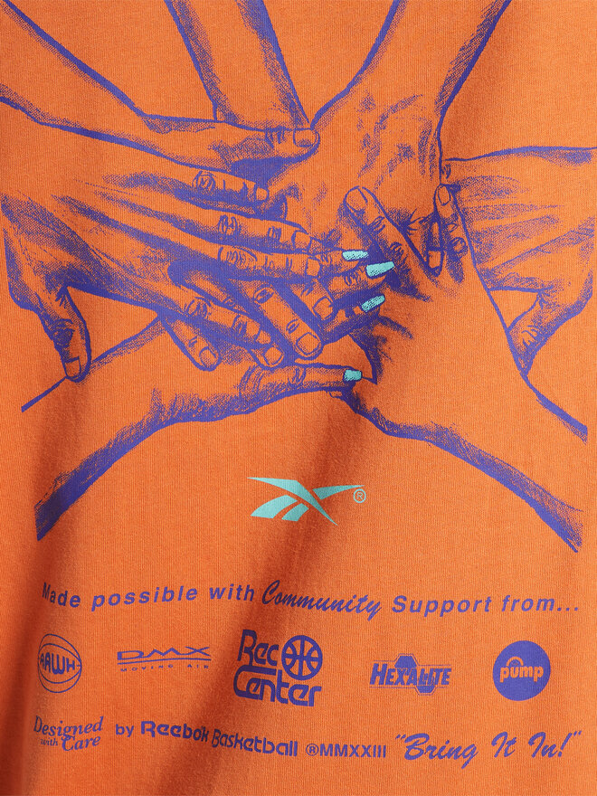 Reebok Reebok Póló Reebok Basketball All Are Welcome Here Hoop Together T-Shirt HN5800 Narancssárga Relaxed Fit