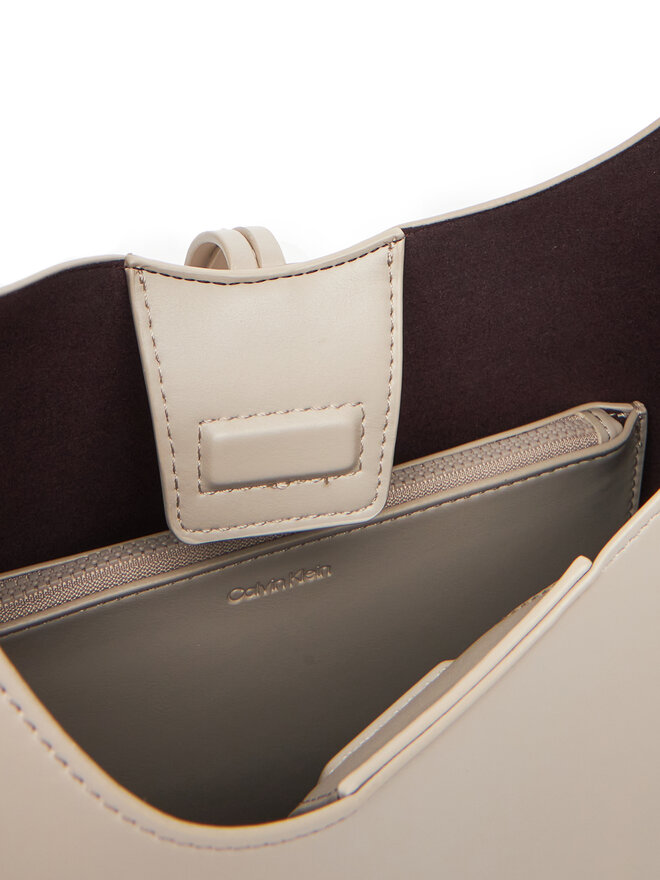 Calvin Klein Jeans Torbica Calvin Klein Jeans Stone Lock Slouchy Small Shoulde LV04K3176G Écru
