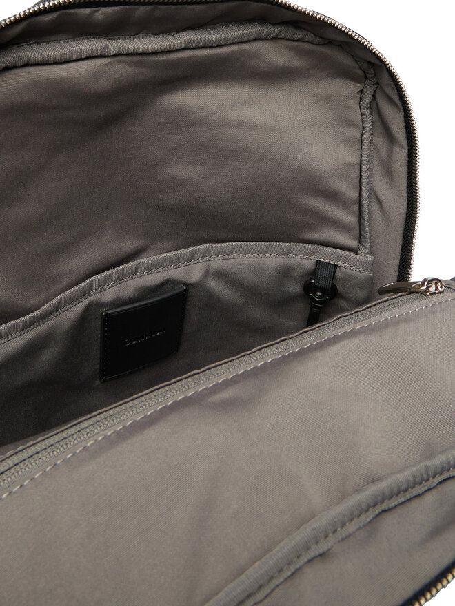 Calvin Klein Umhängetasche Calvin Klein Emblem Aop Emboss Slim Square Bp LV04D3328G Schwarz