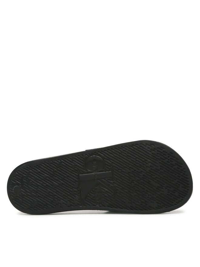 Calvin Klein Jeans Pantoletten Calvin Klein Jeans Slide Oversized Brand YM0YM00662 Schwarz