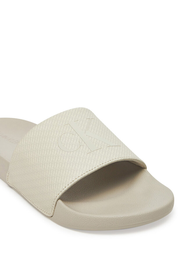Calvin Klein Jeans Iešļūcenes Calvin Klein Jeans Slide Aop Print YM0YM01269 Bēšs