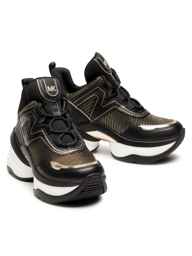 Michael kors trainers black and gold top