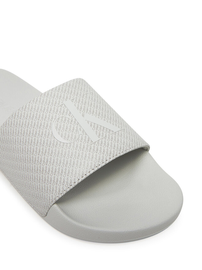 Calvin Klein Jeans Pantoletten Calvin Klein Jeans Slide Aop Print YM0YM01269 Grau