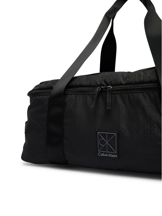 Calvin Klein Ceļojuma soma Calvin Klein Utility Emblem Aop LV04D3385G Melns