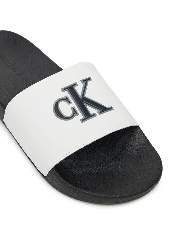 Calvin Klein Jeans Natikači Calvin Klein Jeans Slide Jelly Mono Pu YM0YM01281 Bela