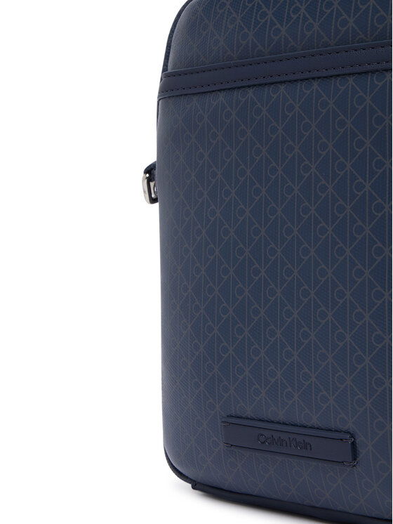 Calvin Klein Geantă crossover Calvin Klein Emblem Aop Coated Slim Reporter LV04D3334G Bleumarin