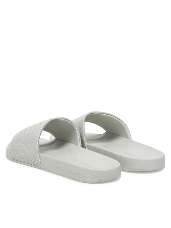 Calvin Klein Jeans Ciabatte Calvin Klein Jeans Slide Aop Print YM0YM01269 Grigio