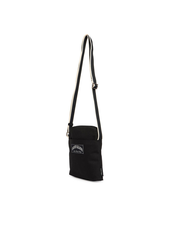 Calvin Klein Taška cez rameno Calvin Klein Graphic Capsule Reporter LV04D3346G Čierna
