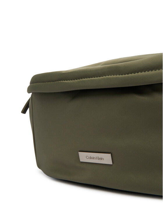 Calvin Klein Torbica za okrog pasu﻿ Calvin Klein Sleek Waistbag Sling LV04D3148G Zelena