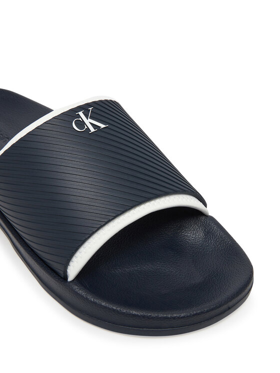 Calvin Klein Jeans Şlapi Calvin Klein Jeans Slide Rubber Neoprene Text YM0YM01234 Bleumarin