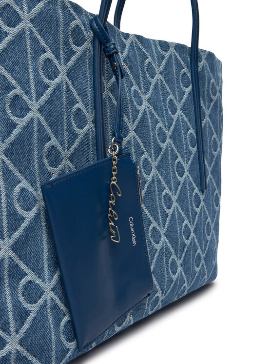 Calvin Klein Ročna torba Calvin Klein Emblem Aop Denim Tote W/ Pouch LV04F3428G Modra