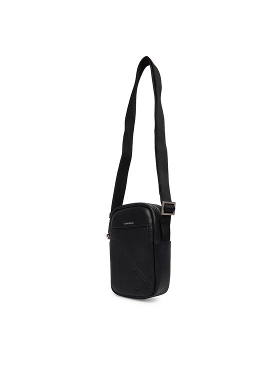 Calvin Klein Τσαντάκι Calvin Klein Emblem Aop Emboss Slim Reporter LV04D3371G Μαύρο