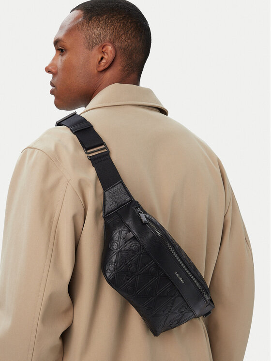 Calvin Klein Övtáskák Calvin Klein Emblem Aop Deboss Waistbag LV04D3564G Fekete