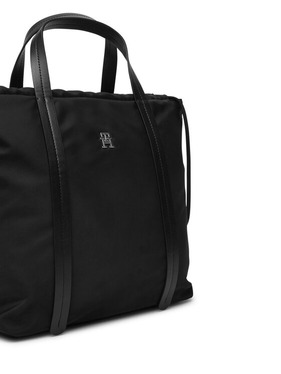 Torebka shopper, ujęcie pod kątem, widoczne uchwyty i boczny sznurek.
