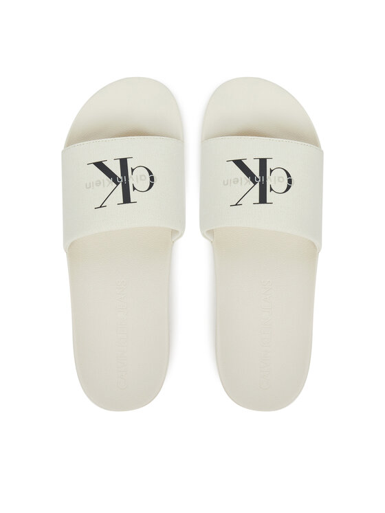 Calvin Klein Jeans Klapki Calvin Klein Jeans Slide Monologo Cv YM0YM01367 Biały