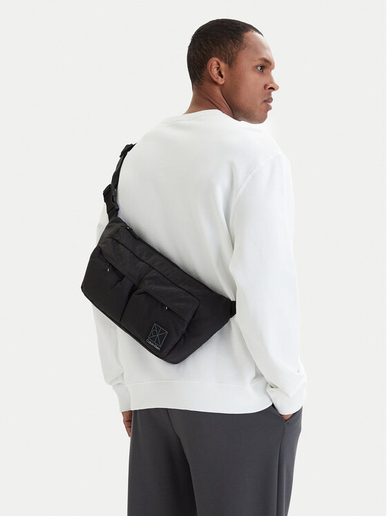 Calvin Klein Rankinė ant juosmens﻿ Calvin Klein Utility Emblem Sling Waistbag LV04D3341G Juoda