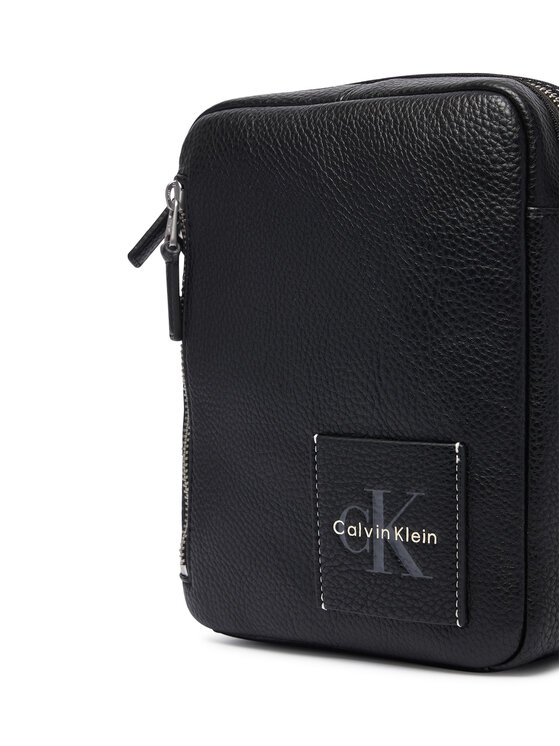Calvin Klein Brašna Calvin Klein Bold Pebble Simple Reporter LV04D3623G Černá