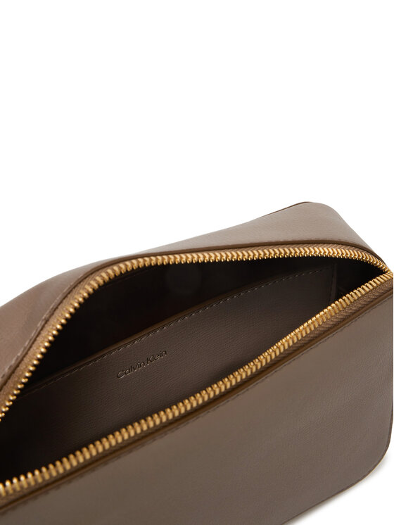Calvin Klein Ročna torba Calvin Klein Foil Logo Elongated Camera Bag LV04F3276G Bež