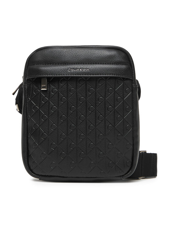 Calvin Klein Crossover torbica Calvin Klein Emblem Emboss Reporter LV04D3204G Crna