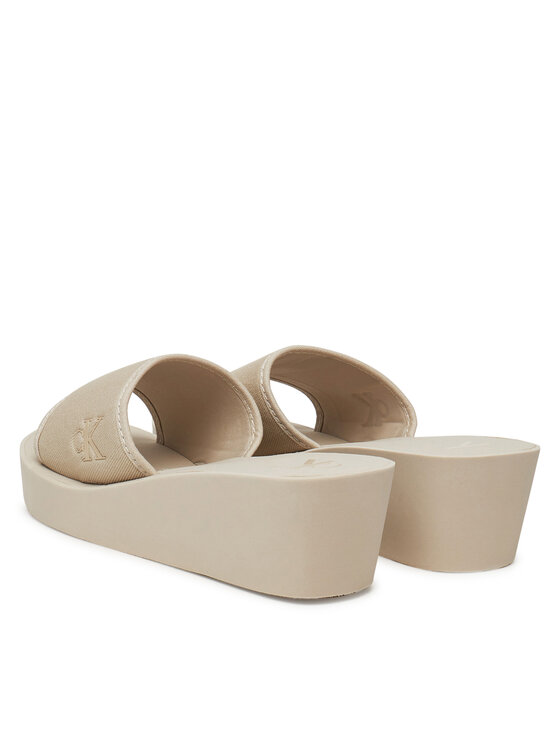 Calvin Klein Jeans Šlepetės Calvin Klein Jeans Beach Wedge Slide Canvas YW0YW01725 Smėlio
