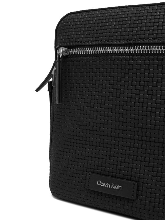 Calvin Klein Brašna Calvin Klein Embossed Woven Reporter LV04D3208G Černá