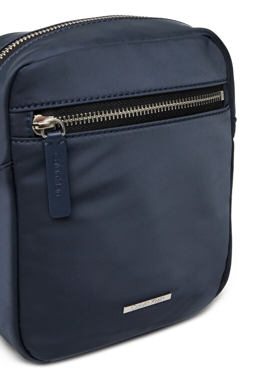 Calvin Klein Somiņa Calvin Klein Sleek Nylon Reporter LV04D3176G Tumši zils