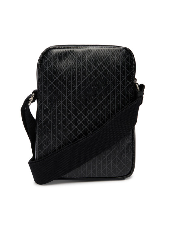 Calvin Klein Saszetka Calvin Klein Emblem Aop Coated Slim Reporter LV04D3334G Czarny