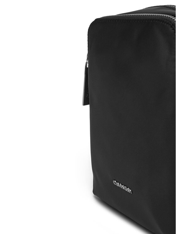Calvin Klein Geantă crossover Calvin Klein Business Tech Reporter Xs K50K512888 Negru