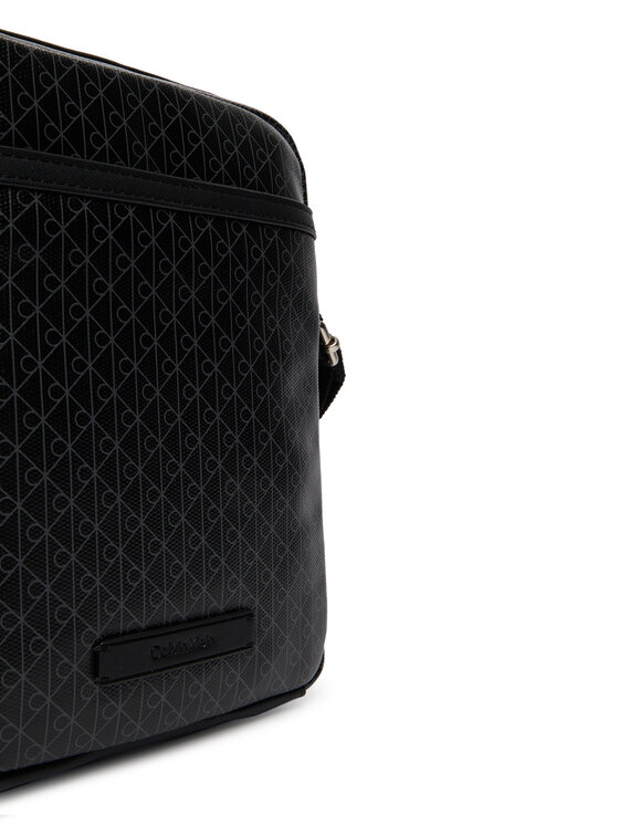 Calvin Klein Crossover torbica Calvin Klein Emblem Aop Coated Slim Reporter LV04D3334G Crna