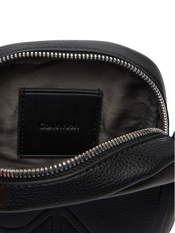 Calvin Klein Maža rankinė Calvin Klein Emblem Aop Emboss Slim Reporter LV04D3371G Juoda