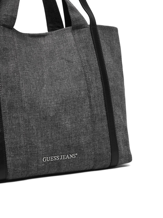 Zbliżenie na dolną część torby shopper, widoczne rączki.