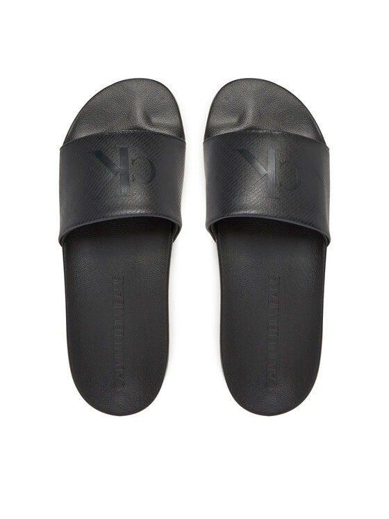 Calvin Klein Jeans Natikači Calvin Klein Jeans Slide Aop Print YM0YM01269 Črna