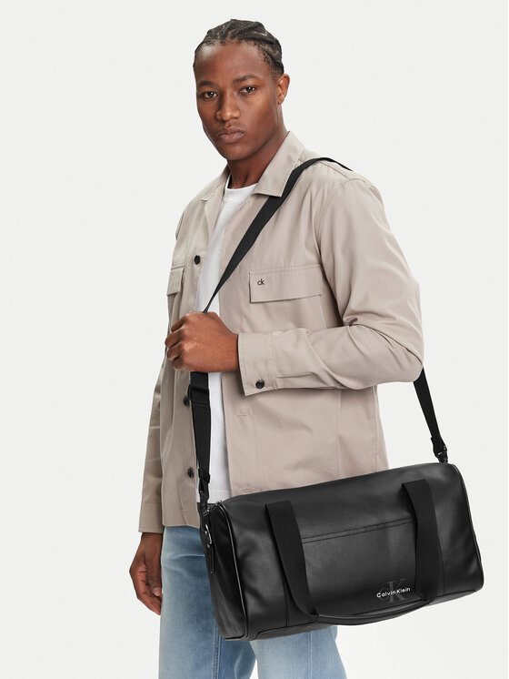 Calvin Klein Pārnēsajamā soma Calvin Klein Mono Logo Duffle 42 LV04G3054G Melns
