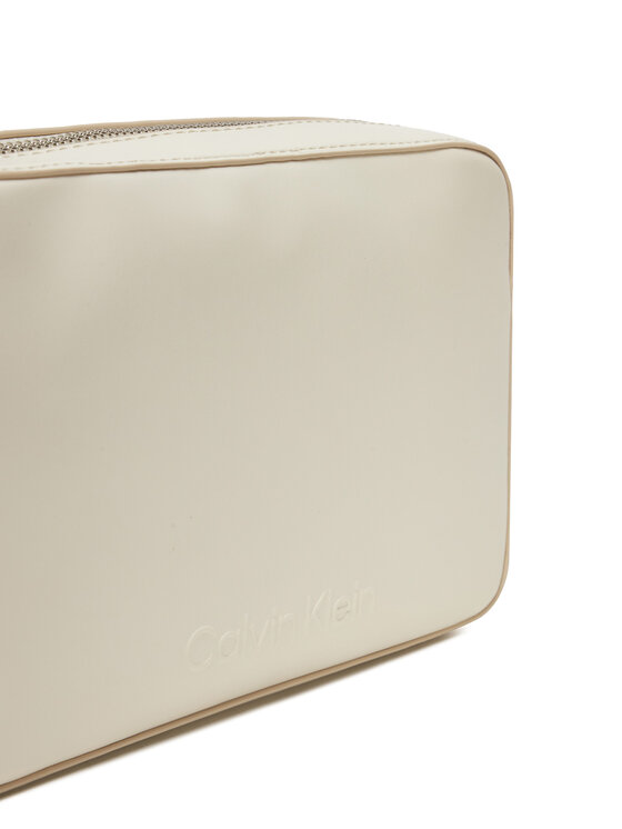 Calvin Klein Ročna torba Calvin Klein Embossed Logo Camera Bag K60K612555 Bež