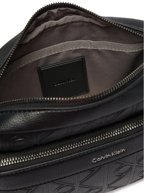 Calvin Klein Brašna Calvin Klein Emblem Aop Deboss Camera Bag LV04D3563G Černá