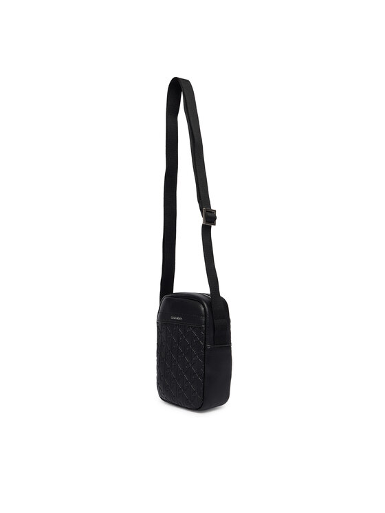 Calvin Klein Borsellino Calvin Klein Emblem Aop Emboss Slim Reporter LV04D3228G Nero